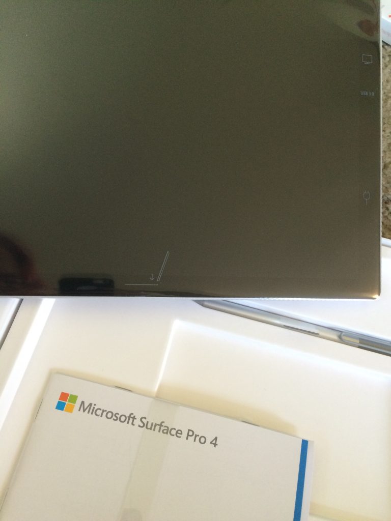 Little details like this "pen magnetically attaches here" icon on the plastic covering the tablet's screen made me anticipate an Apple level of polish throughout the whole thing. Surely I'd have it seamlessly running Illustrator in an hour or two!